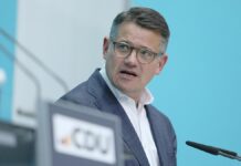 Rhein sieht Umgang mit Migration als "Schicksalsfrage"