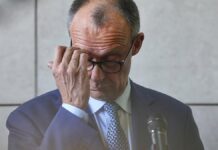 Oettinger macht Druck auf Merz