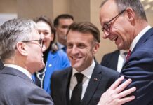 Merz plaudert mit Starmer und Macron beim Abendessen